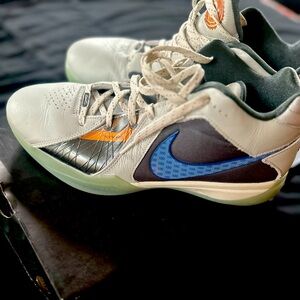 Nike Athletic Shoes in White, Orange, and Blue